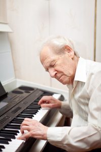 Senior Man Playing Piano