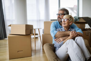 Seniors Downsizing home with moving bozes